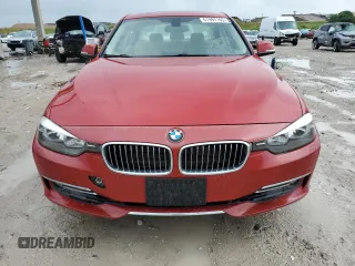 2014 BMW 3 Series 328i xDrive with VIN WBA3B3C59EJ977670, listed as a Copart auction lot 61997165 with 128,937 mi miles and Salvage title. Bid and sale history available at DreamBid. Image 5.