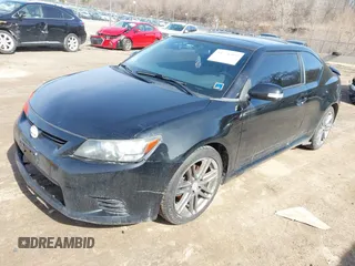 2013 Scion tC with VIN JTKJF5C74D3063012, listed as a IAAI auction lot 41776592 with 142,071 mi miles. Bid and sale history available at carsss.com. Image 2.