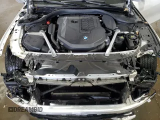 2022 BMW 8 Series 840i with VIN WBAGV4C06NCH11761, listed as a Copart auction lot 79094614 with 37,994 mi miles and Salvage title. Bid and sale history available at DreamBid. Image 12.