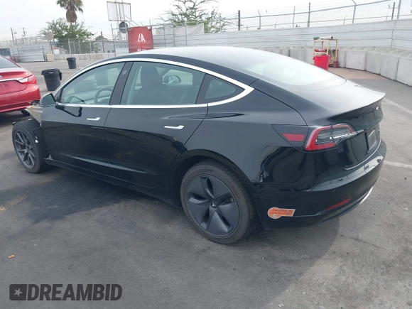2020 Tesla Model 3 Long Range z VIN 5YJ3E1EB0LF600098, wystawiony jako IAAI lot #41071258 z przebiegiem 149 939 mil mil oraz . Historia ofert i sprzedaży dostępna na DreamBid. Obrazek 3.