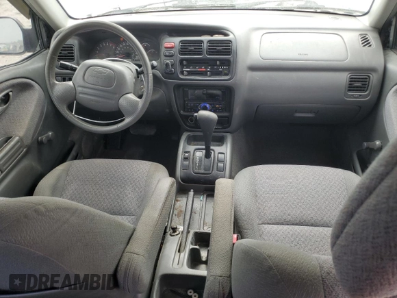 2002 Chevrolet Tracker with VIN 2CNBE13C926934704, listed as a Copart auction lot 70717194 with 189,076 mi miles and Salvage title. Bid and sale history available at DreamBid. Image 8.