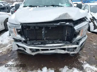 2018 Ford F-150 XL with VIN 1FTFW1E54JKC59793, listed as a IAAI auction lot 41558134 with 217,831 mi miles. Bid and sale history available at carsss.com. Image 6.