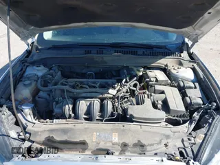 2016 Ford Fusion S z VIN 3FA6P0G75GR105206, wystawiony jako IAAI lot #42032773 z przebiegiem 174 927 mil mil oraz . Historia ofert i sprzedaży dostępna na DreamBid. Obrazek 10.