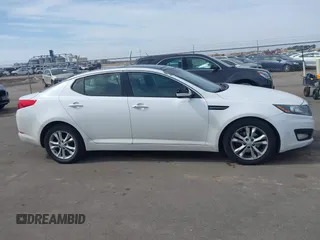 2013 Kia Optima EX with VIN 5XXGN4A7XDG111601, listed as a IAAI auction lot 41810208 with 192,767 mi miles. Bid and sale history available at carsss.com. Image 13.