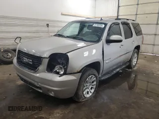 2007 GMC Yukon SLE z VIN 1GKFK13097J142992, wystawiony jako Copart lot #51765335 z przebiegiem 199 991 mil mil oraz Szkoda całkowita • Salvage title. Historia ofert i sprzedaży dostępna na DreamBid. Obrazek 1.