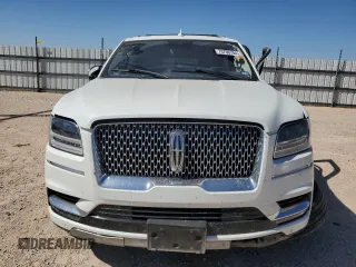 2020 Lincoln Navigator Black Label z VIN 5LMJJ3TT7LEL01308, wystawiony jako Copart lot #73700704 z przebiegiem 70 838 mil mil oraz Szkoda całkowita • Salvage title. Historia ofert i sprzedaży dostępna na DreamBid. Obrazek 5.