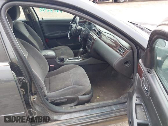2014 Chevrolet Impala LS with VIN 2G1WA5E30E1125611, listed as a IAAI auction lot 41828292 with 141,826 mi miles and . Bid and sale history available at DreamBid. Image 5.