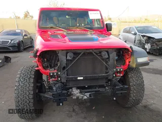 2022 Jeep Wrangler Unlimited Rubicon with VIN 1C4JJXR63NW206709, listed as a IAAI auction lot 41254820 with 25,317 mi miles and . Bid and sale history available at DreamBid. Image 13.