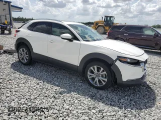 2021 Mazda CX-30 Premium z VIN 3MVDMADM5MM228747, wystawiony jako Copart lot #51747475 z przebiegiem 13 562 mil mil oraz Nie do naprawy • Non repairable. Historia ofert i sprzedaży dostępna na DreamBid. Obrazek 4.