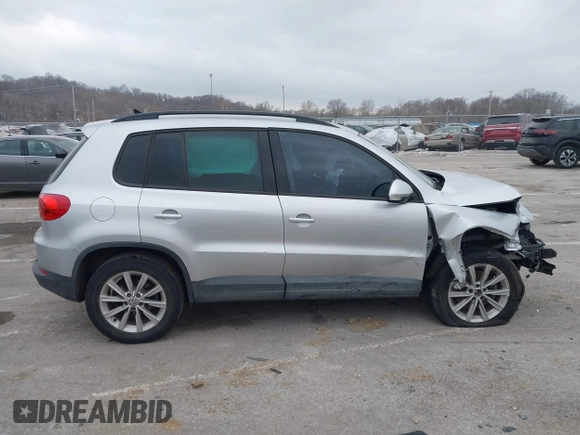 2015 Volkswagen Tiguan SE with VIN WVGAV7AX5FW592216, listed as a IAAI auction lot 41401020 with 110,726 mi miles and . Bid and sale history available at DreamBid. Image 14.