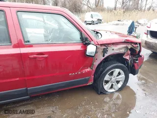 2014 Jeep Patriot Latitude with VIN 1C4NJRFB6ED507548, listed as a IAAI auction lot 41344760 with 120,339 mi miles. Bid and sale history available at carsss.com. Image 6.