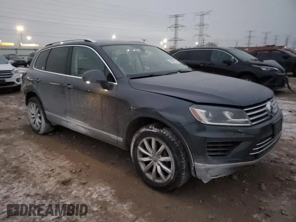 2016 Volkswagen Touareg Sport with VIN WVGEF9BP2GD005296, listed as a Copart auction lot 88808735 with 133,429 mi miles and Salvage Title. Bid and sale history available at DreamBid. Image 4.