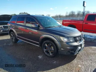 2018 Dodge Journey Crossroad with VIN 3C4PDDGG6JT499291, listed as a IAAI auction lot 41229930 with 169,539 mi miles. Bid and sale history available at carsss.com. Image 1.