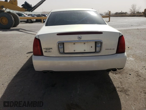 2004 Cadillac DeVille z VIN 1G6KD54Y54U181978, wystawiony jako Copart lot #47458905 z przebiegiem 145 708 mil mil oraz Szkody całkowita. Historia ofert i sprzedaży dostępna na DreamBid. Obrazek 6.