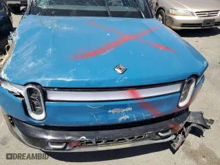 2022 Rivian R1T Adventure Package with VIN 7FCTGAAA4NN010881, listed as a Copart auction lot 58783584 with 0 mi miles and Salvage Title. Bid and sale history available at carsss.com. Image 11.