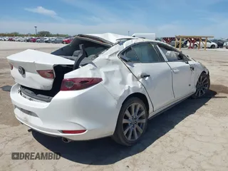 2021 Mazda 3 Select with VIN JM1BPABL0M1333705, listed as a IAAI auction lot 41819213 with 82,977 mi miles and . Bid and sale history available at DreamBid. Image 4.