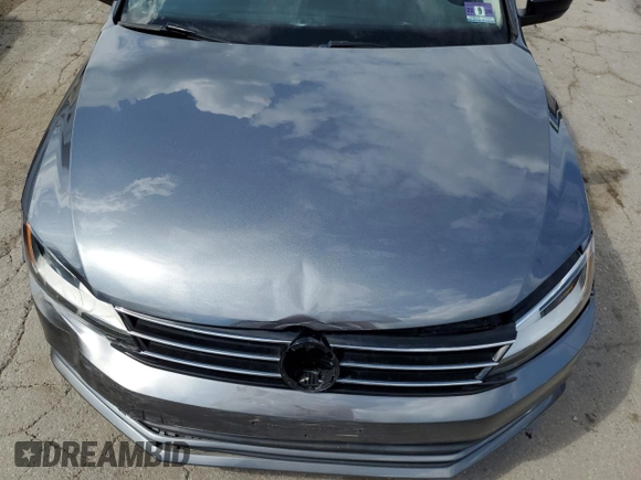 2015 Volkswagen Jetta S with VIN 3VW2K7AJ5FM327788, listed as a Copart auction lot 64034985 with 43,172 mi miles and Salvage title. Bid and sale history available at DreamBid. Image 11.
