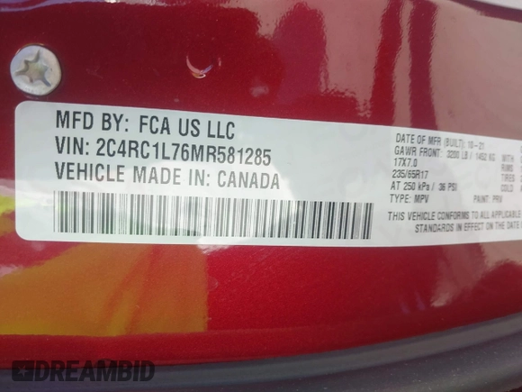 2021 Chrysler Pacifica Hybrid Touring L with VIN 2C4RC1L76MR581285, listed as a IAAI auction lot 42303222 with 77,808 mi miles and . Bid and sale history available at DreamBid. Image 9.