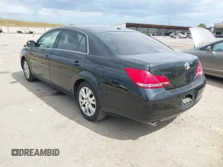 2009 Toyota Avalon XL with VIN 4T1BK36B79U327316, listed as a IAAI auction lot 42130918 with 184,948 mi miles. Bid and sale history available at carsss.com. Image 3.