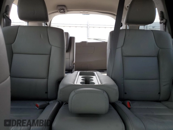 2016 Honda Odyssey EX-L z VIN 5FNRL5H65GB017067, wystawiony jako Copart lot #58424235 z przebiegiem 89 988 mil mil oraz Szkoda całkowita • Salvage title. Historia ofert i sprzedaży dostępna na DreamBid. Obrazek 10.