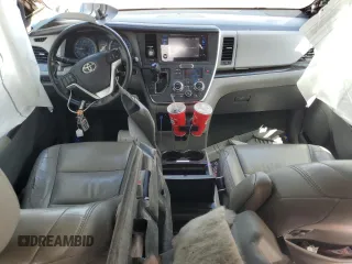 2016 Toyota Sienna XLE with VIN 5TDYK3DC5GS730870, listed as a Copart auction lot 62107505 with 131,619 mi miles and Salvage title. Bid and sale history available at DreamBid. Image 8.