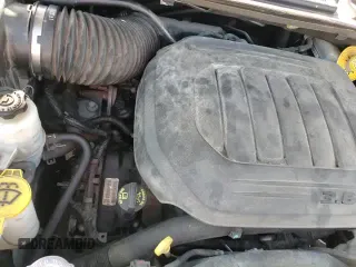 2019 Dodge Grand Caravan GT with VIN 2C4RDGEGXKR623130, listed as a Copart auction lot 84277205 with 107,444 mi miles and Salvage title. Bid and sale history available at DreamBid. Image 16.