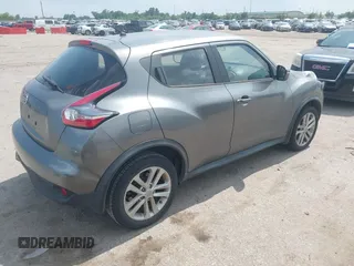 2015 Nissan Juke S with VIN JN8AF5MRXFT507850, listed as a IAAI auction lot 42451267 with 124,891 mi miles and . Bid and sale history available at DreamBid. Image 4.