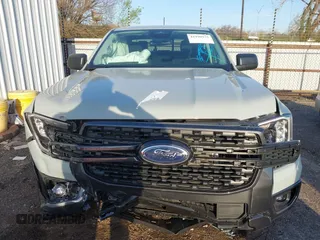 2024 Ford Ranger XLT with VIN 1FTER4GHXRLE59319, listed as a IAAI auction lot 41990936 with 1,002 mi miles and . Bid and sale history available at DreamBid. Image 13.