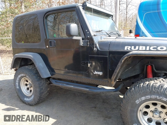 2004 Jeep Wrangler Rubicon with VIN 1J4FA69S64P789308, listed as a IAAI auction lot 41714489 with 186,302 mi miles. Bid and sale history available at carsss.com. Image 13.