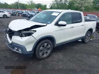 2019 Honda Ridgeline RTL-E with VIN 5FPYK3F75KB020713, listed as a IAAI auction lot 42191152 with 31,245 mi miles and . Bid and sale history available at DreamBid. Image 18.