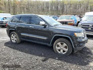 2012 Jeep Grand Cherokee Limited with VIN 1C4RJFBG8CC114896, listed as a Copart auction lot 51748275 with 212,278 mi miles and Salvage Title. Bid and sale history available at carsss.com. Image 4.