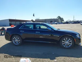 2019 Chrysler 300 Limited with VIN 2C3CCAKG8KH610865, listed as a IAAI auction lot 41668294 with 121,656 mi miles. Bid and sale history available at carsss.com. Image 13.