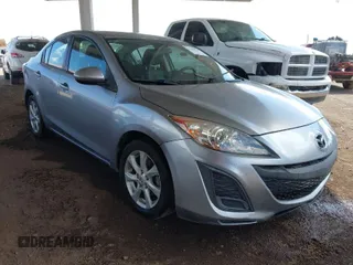 2011 Mazda Mazda3 i Touring with VIN JM1BL1VG1B1491171, listed as a IAAI auction lot 41886159 with 127,674 mi miles. Bid and sale history available at carsss.com. Image 1.