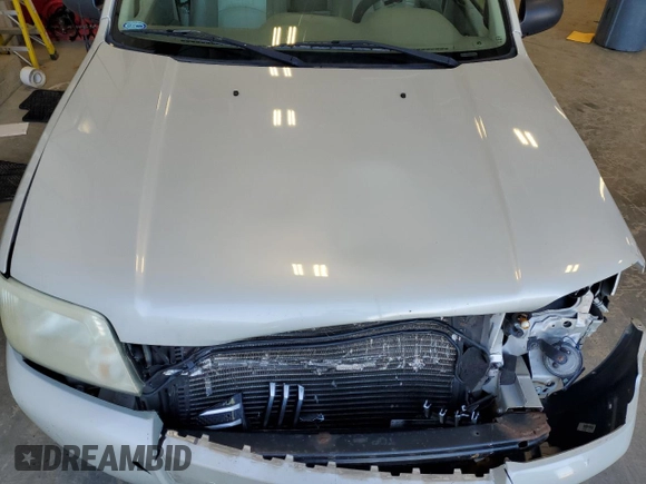 2007 Mercury Mariner Premier с VIN 4M2CU971X7KJ03424, выставлен на аукционе Copart как лот 51340895 с пробегом 185 576 миль миль и На запчасти • Non repairable. История ставок и продаж доступна на DreamBid. Изображение 11.