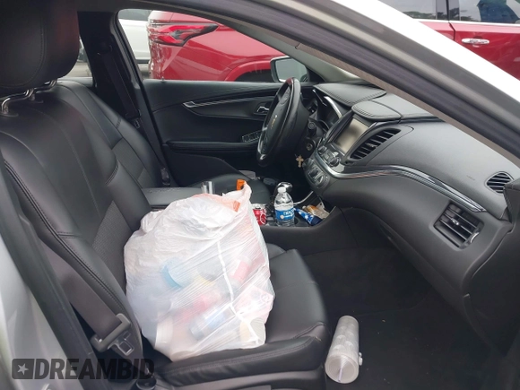 2016 Chevrolet Impala LT with VIN 2G1105SA5G9185565, listed as a IAAI auction lot 42430184 with 143,791 mi miles and . Bid and sale history available at DreamBid. Image 5.