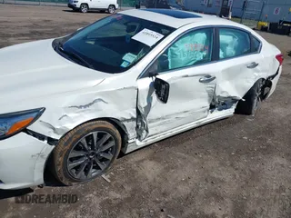 2016 Nissan Altima SR with VIN 1N4AL3AP7GC149531, listed as a IAAI auction lot 41893524 with 48,058 mi miles and . Bid and sale history available at carsss.com. Image 6.
