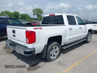 2018 Chevrolet Silverado 1500 LTZ with VIN 3GCUKSEC5JG316257, listed as a IAAI auction lot 39563628 with 62,872 mi miles. Bid and sale history available at carsss.com. Image 4.