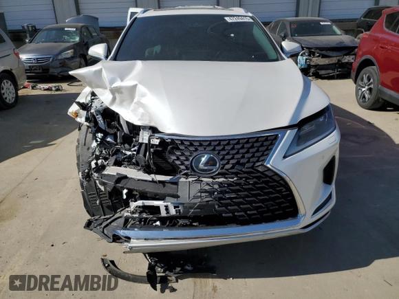 2020 Lexus RX 350L with VIN JTJHZKFA7L2025617, listed as a Copart auction lot 47249415 with 86,045 mi miles and Salvage title. Bid and sale history available at DreamBid. Image 5.