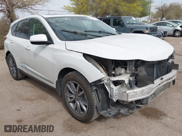 2021 Acura RDX w/Technology Package with VIN 5J8TC1H51ML022573, listed as a IAAI auction lot 41893265 with 56,516 mi miles. Bid and sale history available at carsss.com. Image 1.