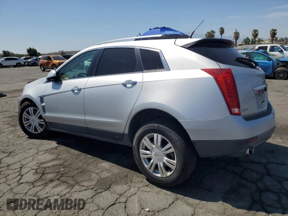 2012 Cadillac SRX Luxury Collection with VIN 3GYFNAE36CS653119, listed as a Copart auction lot 53866715 with 69,997 mi miles and Salvage Title. Bid and sale history available at DreamBid. Image 2.