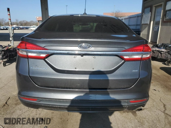 2017 Ford Fusion SE z VIN 3FA6P0H7XHR226250, wystawiony jako Copart lot #52697895 z przebiegiem 140 860 mil mil oraz Szkoda całkowita • Salvage title. Historia ofert i sprzedaży dostępna na DreamBid. Obrazek 6.
