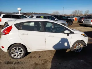 2019 Ford Fiesta SE z VIN 3FADP4EJ0KM148306, wystawiony jako IAAI lot #41666170 z przebiegiem 68 966 mil mil oraz . Historia ofert i sprzedaży dostępna na DreamBid. Obrazek 13.