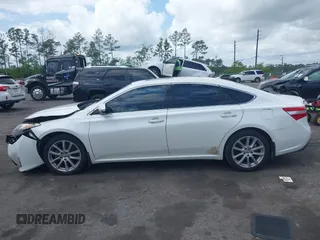 2013 Toyota Avalon XLE with VIN 4T1BK1EB4DU047982, listed as a IAAI auction lot 42011402 with 122,645 mi miles and . Bid and sale history available at DreamBid. Image 14.