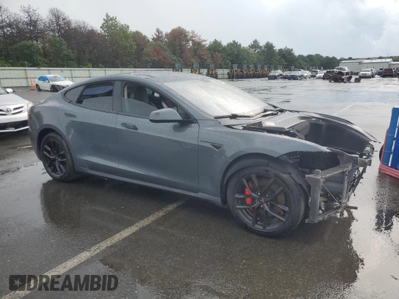 2014 Tesla Model S 60 with VIN 5YJSA1H14EFP28471, listed as a Copart auction lot 64928534 with 99,442 mi miles and Clean Title. Bid and sale history available at DreamBid. Image 4.