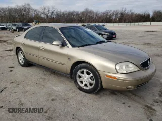 2000 Mercury Sable LS Premium z VIN 1MEFM55S0YA621927, wystawiony jako Copart lot #87052444 z przebiegiem 34 930 mil mil oraz Szkoda całkowita • Salvage title. Historia ofert i sprzedaży dostępna na DreamBid. Obrazek 4.