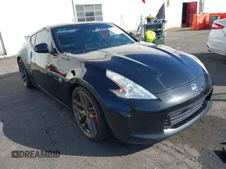 2013 Nissan 370Z with VIN JN1AZ4EH1DM880739, listed as a IAAI auction lot 40474120 with 76,369 mi miles. Bid and sale history available at carsss.com. Image 1.