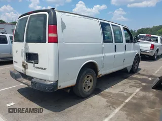 2003 Chevrolet Express Cargo with VIN 1GCFG15X731132818, listed as a IAAI auction lot 42668266 with 473,429 mi miles and . Bid and sale history available at DreamBid. Image 4.