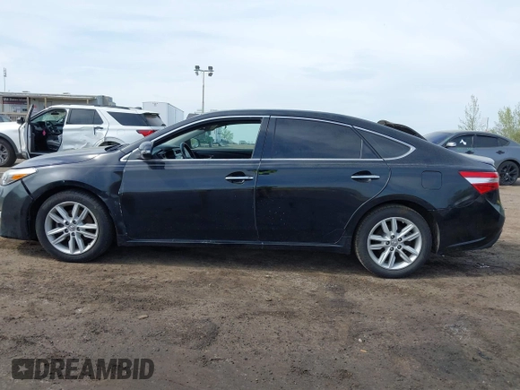 2013 Toyota Avalon XLE with VIN 4T1BK1EB3DU051683, listed as a IAAI auction lot 42118150 with 177,504 mi miles and . Bid and sale history available at DreamBid. Image 14.