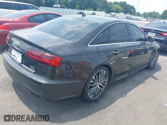 2016 Audi A6 Premium Plus with VIN WAUGFAFCXGN014941, listed as a IAAI auction lot 42566044 with 162,659 mi miles and . Bid and sale history available at DreamBid. Image 4.