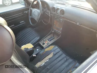 1987 Mercedes-Benz 560 560SL with VIN WDBBA48D9HA070265, listed as a Copart auction lot 77411844 with 120,884 mi miles and Salvage Title. Bid and sale history available at carsss.com. Image 8.